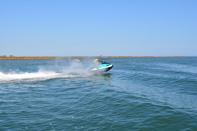 1 Hour Jet Ski Experience in Isla Canela - Back Through the Coastline, Plus the Open-Sea Swim
