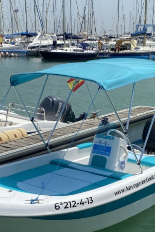 Cadiz: Boat Rental Without License - Meet the boat: canopy, swim ladder, mattresses, and a 15 hp Suzuki