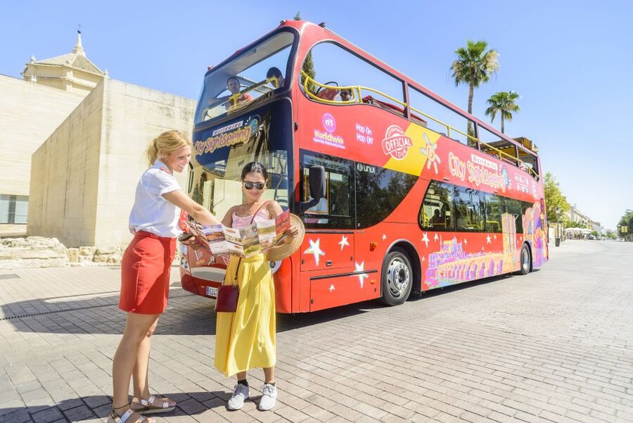 Córdoba: City Sightseeing Hop-On Hop-Off Bus Tour - The audio guide setup: headphones, timing, and how to avoid missing stops