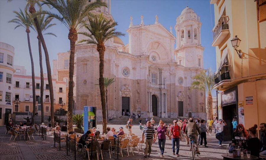From Seville: Cadiz and Jerez de la Frontera Day Trip - El Pópulo and Cádiz’s cathedral area: old streets with a guide’s map