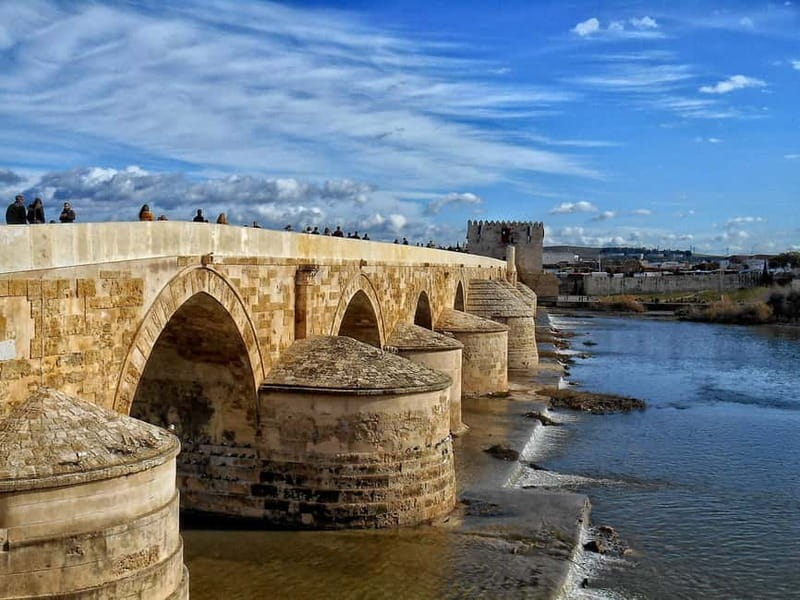From Seville: Cordoba Day Trip with Guided Tour - La Carlota Stop, Roman Bridge Views, and Quick Photo Minutes