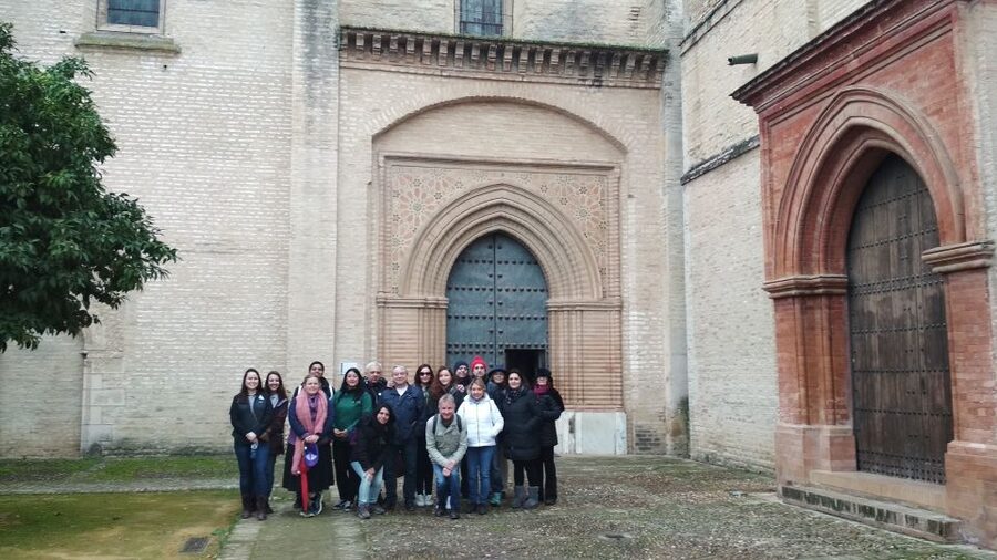 From Seville: Italica Roman City & Medieval Monastery Tour - Mosaics, gladiator passages, and the lion den detail that sticks