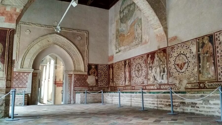 From Seville: Italica Roman City & Medieval Monastery Tour - San Isidoro del Campo: a monastery with Roman neighbors in your head