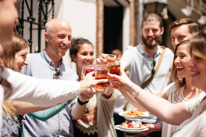 Private Seville Tapas & History Tour - Las Golondrinas - Pagés del Corro since 1962: pork loin and a sangria cousin
