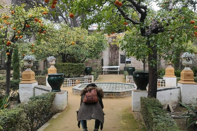 Private Walking Tour Alcazar and Cathedral in Sevilla - Real Alcázar: Islamic foundations, palace patios, and royal use today