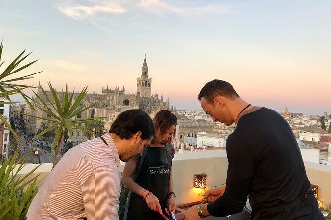 Sevilla: Rooftop Paella Cooking Class & 30-minute expert Q&A - The Rooftop Paella Feast: Eating What You Built