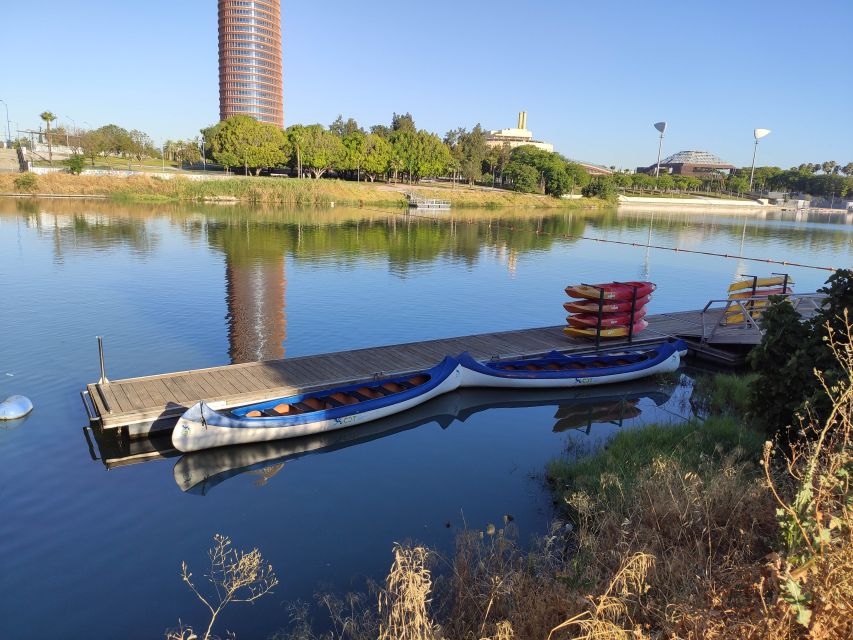 Seville: 2 Hour Paddle Surf Class - The Barrio de Triana dock stop: soda, a possible dip, and a real break
