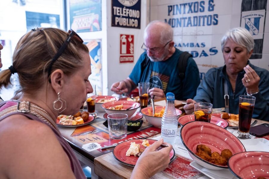 Seville Adventure: Historic Walking Tour & Traditional Tapas - How the included tapas and drinks shape the whole experience