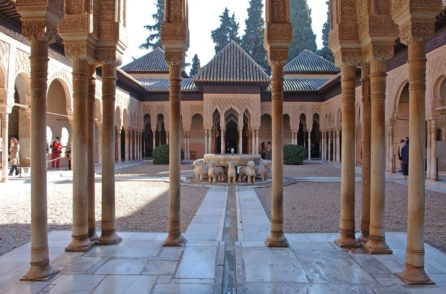 Seville: Alhambra Day Trip with Guide & Nasrid Palaces Entry - Getting picked up at Torre Sevilla and what the drive to Granada feels like