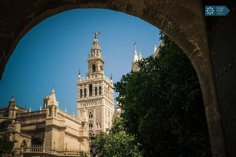 Seville: Cathedral, Giralda, and Royal Alcázar Guided Tour - Seville Cathedral: Gothic Scale, Stained Glass, and Columbus