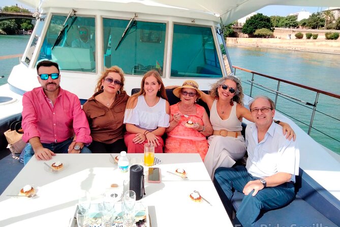 Seville: Cruise along the Guadalquivir River with appetizer - Your Best Seat Choice: Deck Views vs Inside Comfort