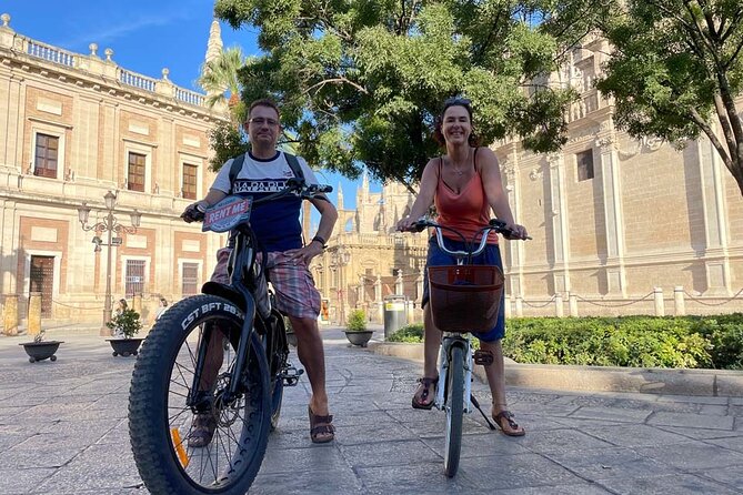 Seville ElectricBike Tour 2h | Explore Like a Local | Small Group - Universitat de Sevilla old tobacco factory: the short stop that pays off