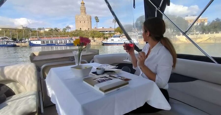 Seville: Exclusive River Boat Tour with Tapas - Start in Triana, then glide past La Cartuja and the 1992 Expo area