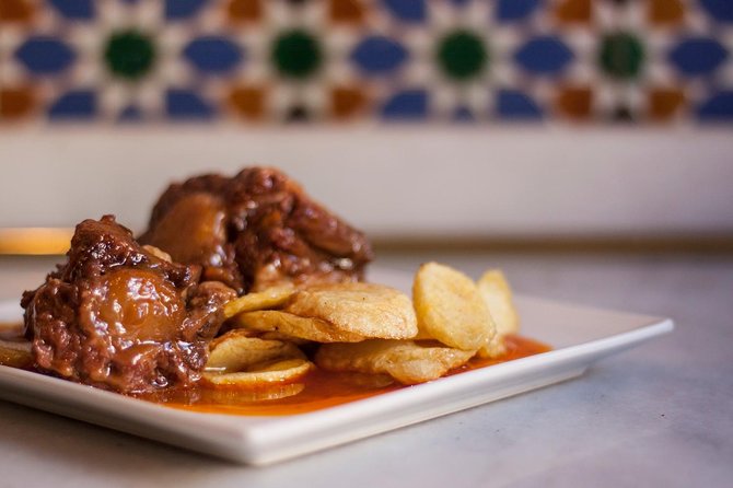 Seville Food Tour: Vermut, Churros & 10+ Tasty Local Dishes - What you actually taste: vermut, churros, ham, and 10+ local bites