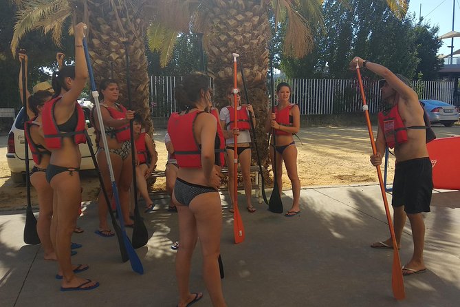 Seville Paddle Surf Sup in the Guadalquivir River - Puente de Isabel II: The Bridge Pass-Under Moment