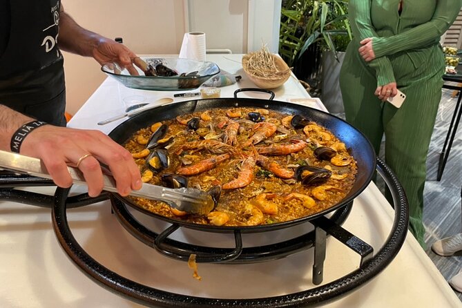 Seville: Paella Showcooking Experience - A Rooftop Dinner With River Views, Not a Back-Of-House Meal