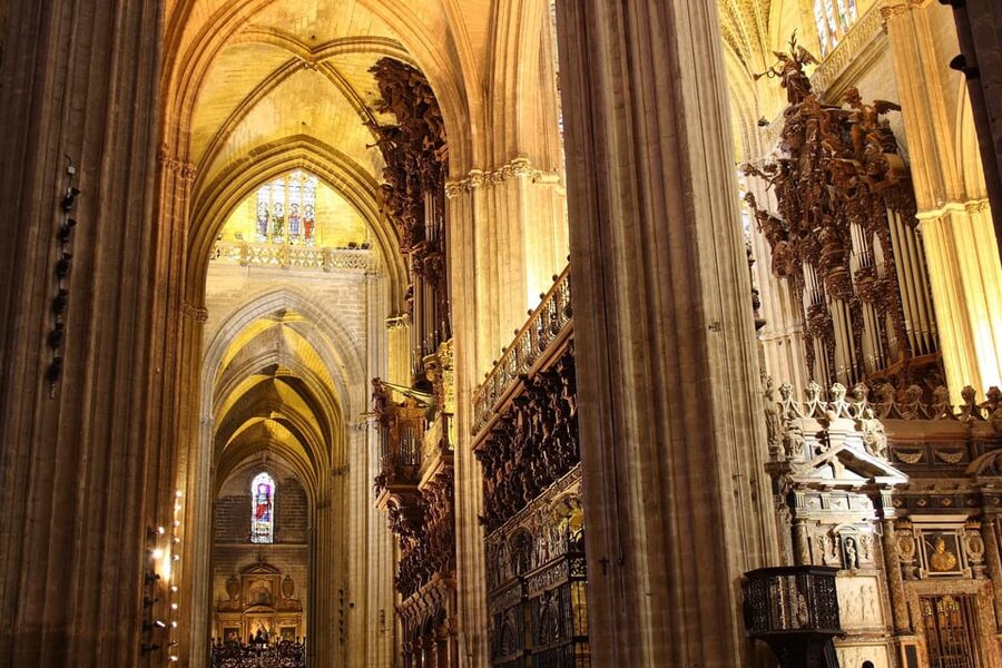 Seville: Priority Access Cathedral & Giralda Tour - Climbing the Giralda: ramps, views, and limited capacity