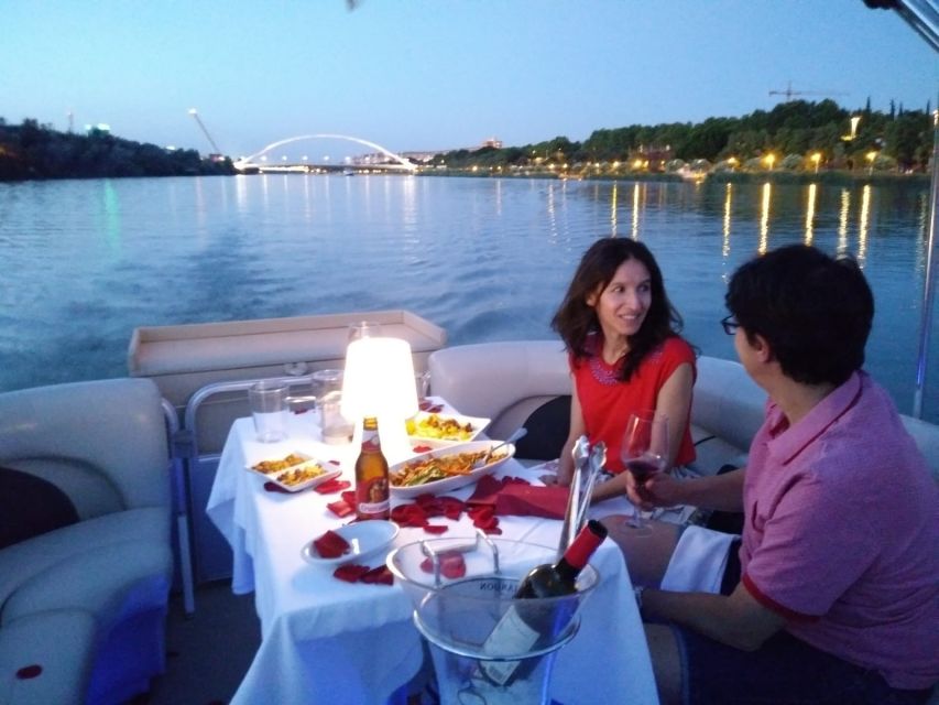 Seville: Private Boat Tour with Paella Lunch and Drinks - The cruise flow: aperitif, guided monuments, then paella lunch