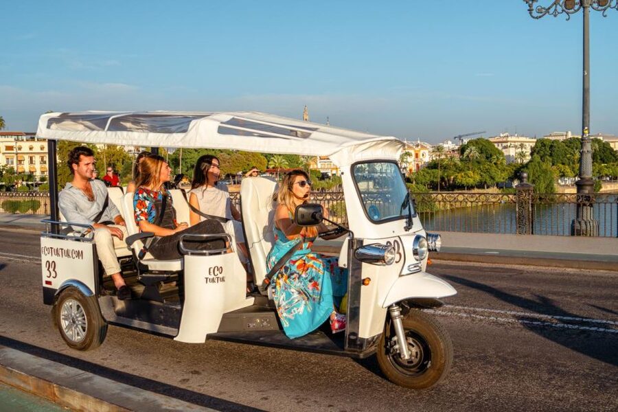 Seville: Private City Tour by Eco Tuk Tuk - Maria Luisa Park and the Guadalquivir River: the calmer part of the loop