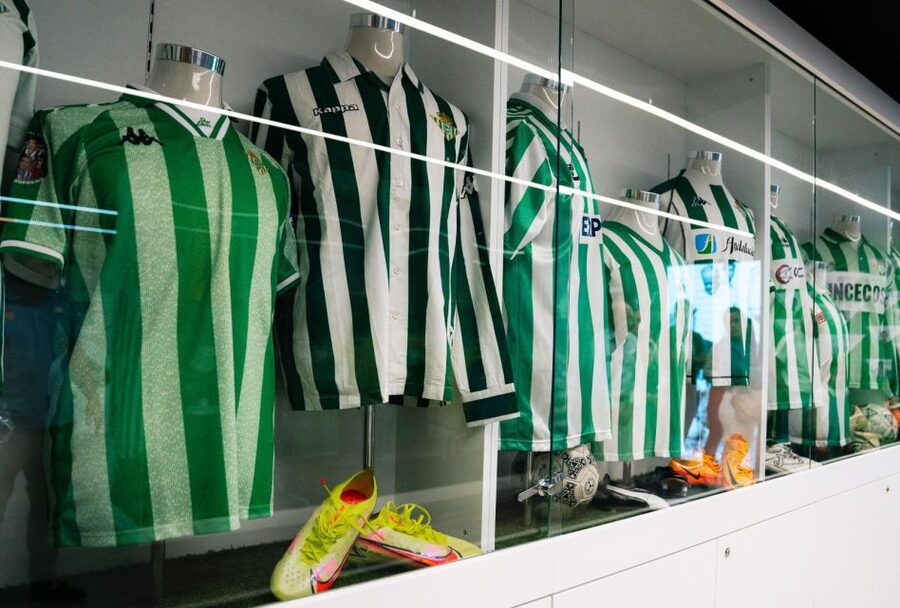 Seville: Real Betis Tour at the La Cartuja Stadium - Real Betis Tour exhibition hall: trophies, symbols, and a big photo zone