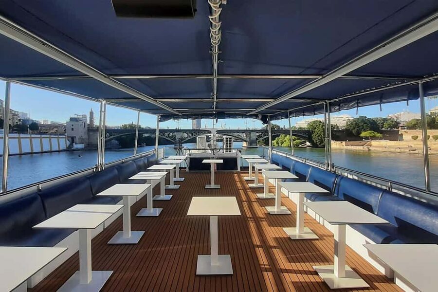 Seville: Restaurant boat ride on the Guadalquivir River with lunch/dinner - Meet El Miarma Dos: comfort, views, and how to choose your spot