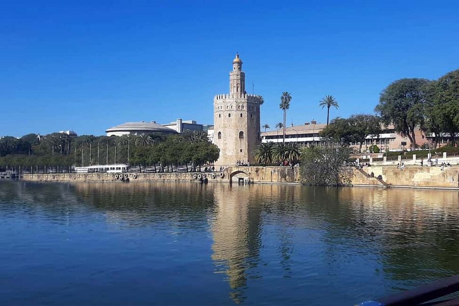 Seville: Restaurant boat ride on the Guadalquivir River with lunch/dinner - Service style: crew-led hospitality with a relaxed pace