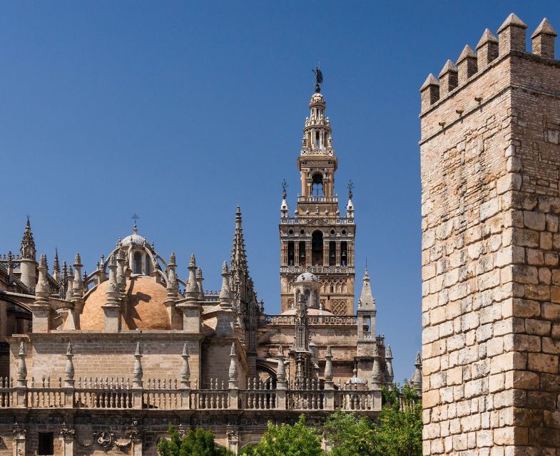 Seville: Small-Group City Highlights Walking Tour - Torre del Oro: A Landmark That Tells a City Story