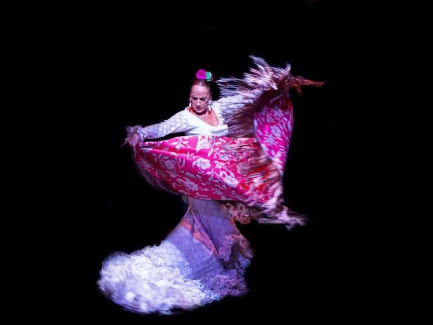Seville: Tapas Dinner and Flamenco Show - Arenal at night: why tapas then flamenco is such a smart pairing