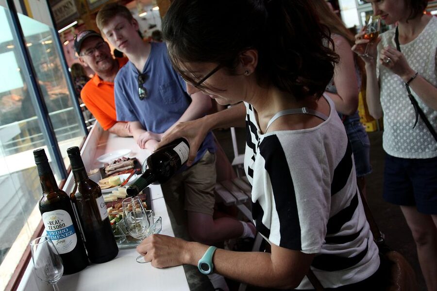 Seville: Triana Market Tour with Tastings - Cheese and ham tastings that teach your palate fast