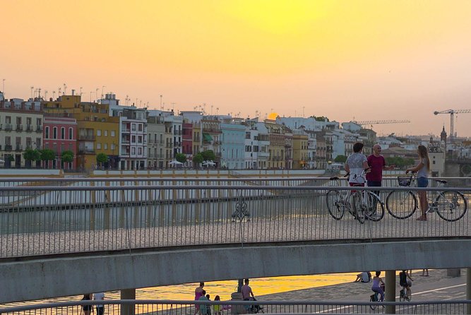 Sunset Guided Bike Tour in Seville - Meeting at Mercado del Arenal and what the ride feels like