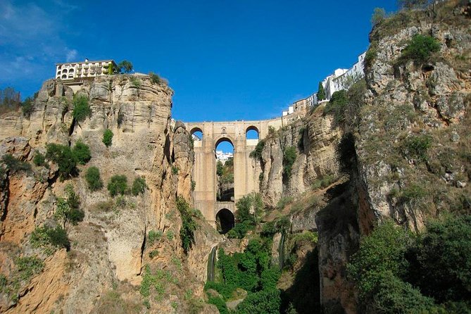 White Villages and Ronda Guided Day Tour from Seville - Stop 1 in Zahara de la Sierra: the White Village feel, fast and photogenic